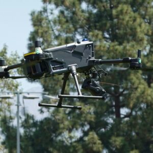 A drone flies in the sky.