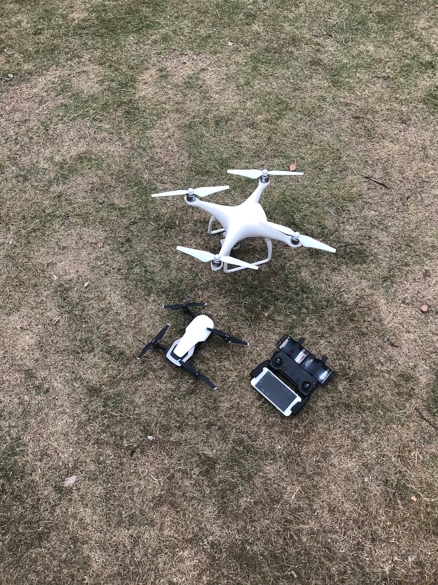 white DJI Mavic Pro drone set on grass